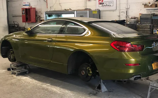 Photo of PROfection Auto Body, an auto repair shop in Rochester, NY